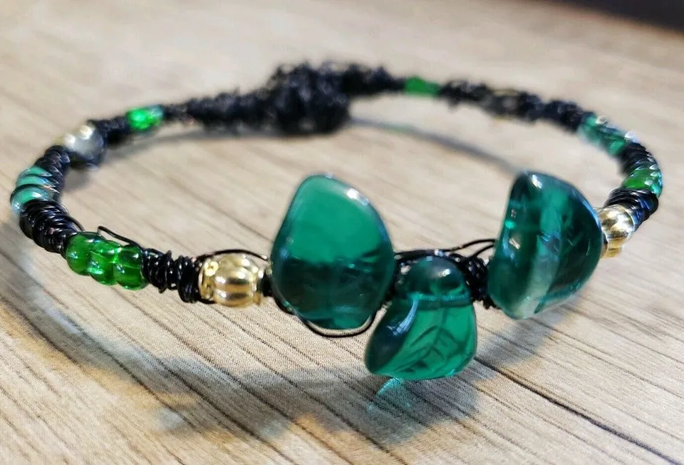 Hand Crafted Black Memory Wire Wrapped Bracelet, with Green Czech Glass and Gold Tone Metal Beads